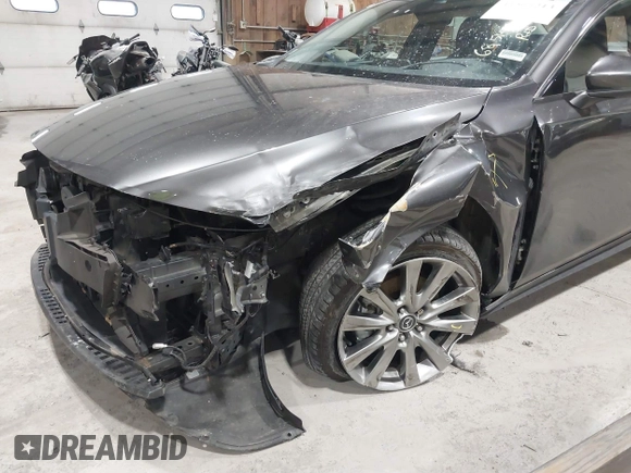 2020 Mazda 3 Premium with VIN 3MZBPBEM3LM123091, listed as a IAAI auction lot 41568213 with 68,515 mi miles and . Bid and sale history available at DreamBid. Image 6.