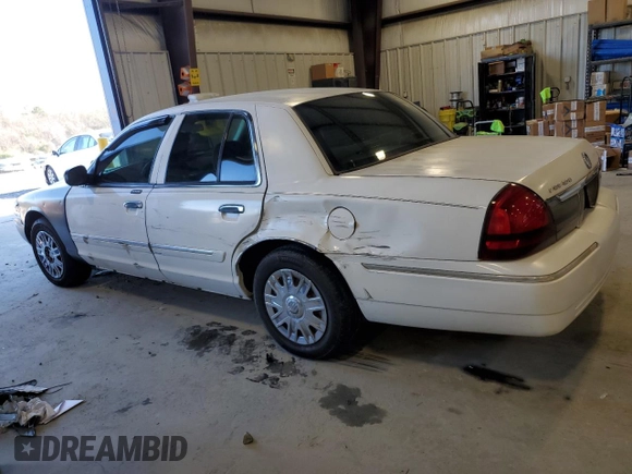 2006 Mercury Grand Marquis GS z VIN 2MEFM74V96X621050, wystawiony jako Copart lot #49098465 z przebiegiem 75 561 mil mil oraz Szkoda całkowita • Salvage title. Historia ofert i sprzedaży dostępna na DreamBid. Obrazek 2.