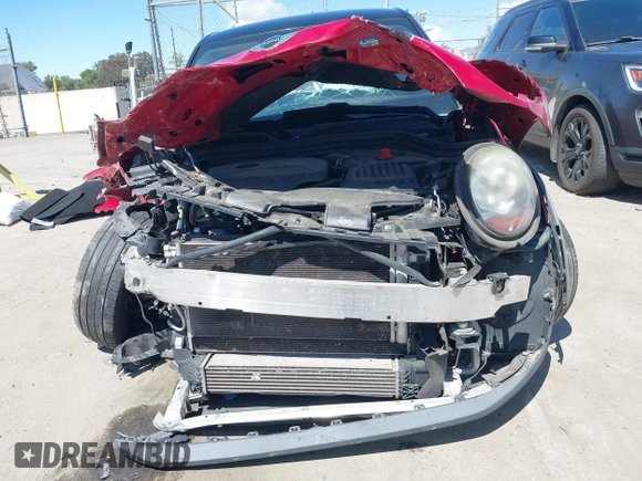 2017 MINI Hardtop 4 Door Cooper z VIN WMWXU1C57H2E18670, wystawiony jako IAAI lot #41950314 z przebiegiem 94 199 mil mil oraz . Historia ofert i sprzedaży dostępna na DreamBid. Obrazek 13.