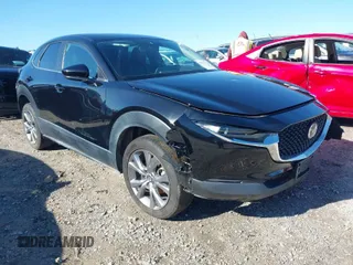 2021 Mazda CX-30 Select with VIN 3MVDMABLXMM254691, listed as a IAAI auction lot 41823081 with 80,082 mi miles. Bid and sale history available at carsss.com. Image 1.