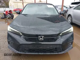 2022 Honda Civic Sedan Touring with VIN 2HGFE1F93NH302409, listed as a IAAI auction lot 41719494 with 34,129 mi miles. Bid and sale history available at carsss.com. Image 12.