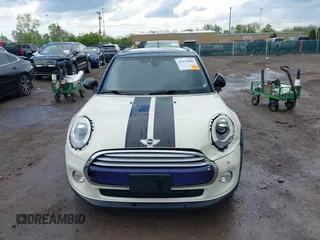 2015 MINI Hardtop 4 Door with VIN WMWXS5C52FT831291, listed as a IAAI auction lot 42179801 with 63,261 mi miles and . Bid and sale history available at DreamBid. Image 13.