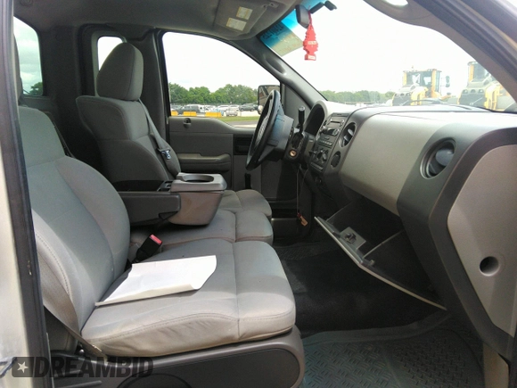 2008 Ford F-150 XL with VIN 1FTRF12218KD25864, listed as a IAAI auction lot 42401225 with 211,038 mi miles and . Bid and sale history available at DreamBid. Image 5.
