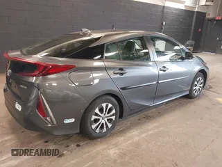 2021 Toyota Prius LE with VIN JTDKAMFP8M3175487, listed as a IAAI auction lot 42176936 with 78,153 mi miles and . Bid and sale history available at DreamBid. Image 4.