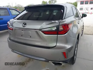 2018 Lexus RX 350 z VIN 2T2BZMCA3JC151296, wystawiony jako IAAI lot #41331203 z przebiegiem 73 051 mil mil oraz . Historia ofert i sprzedaży dostępna na DreamBid. Obrazek 4.