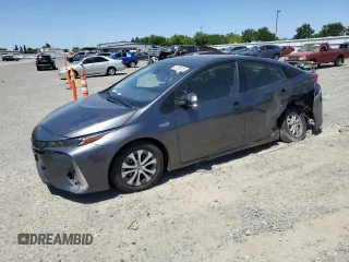 2021 Toyota Prius LE z VIN JTDKAMFPXM3190346, wystawiony jako Copart lot #57626675 z przebiegiem 102 786 mil mil oraz Szkoda całkowita • Salvage title. Historia ofert i sprzedaży dostępna na DreamBid. Obrazek 1.