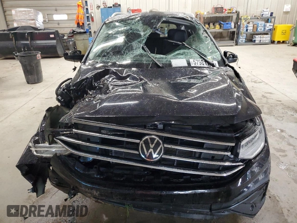 2023 Volkswagen Tiguan SE with VIN 3VVMB7AX3PM021515, listed as a Copart auction lot 57981775 with 23,885 mi miles and Salvage title. Bid and sale history available at DreamBid. Image 5.
