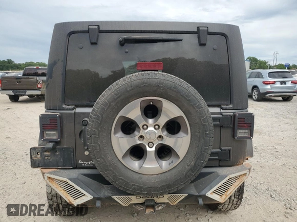 2016 Jeep Wrangler Unlimited Sahara with VIN 1C4BJWEGXGL264740, listed as a Copart auction lot 57225115 with 183,647 mi miles and Salvage title. Bid and sale history available at DreamBid. Image 6.