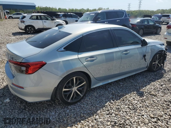 2023 Honda Civic Touring z VIN 2HGFE1F94PH310134, wystawiony jako Copart lot #52311085 z przebiegiem 32 682 mil mil oraz Szkoda całkowita • Salvage title. Historia ofert i sprzedaży dostępna na DreamBid. Obrazek 3.