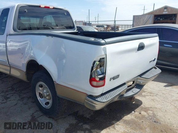 1999 Ford F-150 with VIN 1FTZX1720XKB31945, listed as a IAAI auction lot 42123984 with 187,766 mi miles and . Bid and sale history available at DreamBid. Image 6.