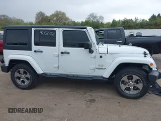 2016 Jeep Wrangler Unlimited Sahara с VIN 1C4HJWEG8GL345391, выставлен на аукционе IAAI как лот 42158328 с пробегом 61 020 миль миль и . История ставок и продаж доступна на DreamBid. Изображение 13.