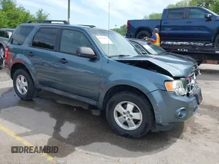 2012 Ford Escape XLT z VIN 1FMCU9DG7CKB91272, wystawiony jako IAAI lot #42168619 z przebiegiem 119 011 mil mil oraz . Historia ofert i sprzedaży dostępna na DreamBid. Obrazek 1.