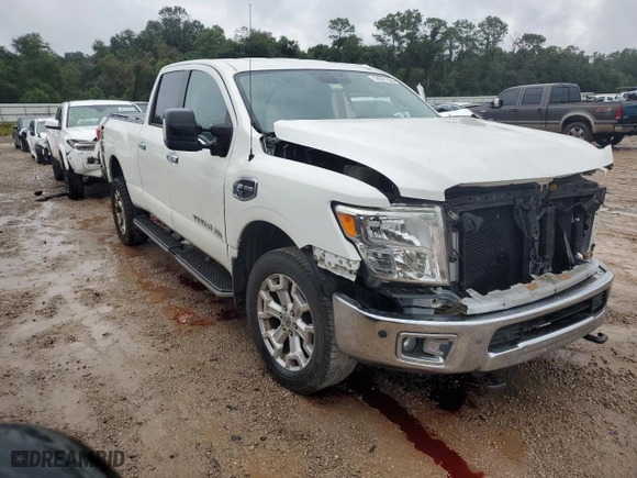 2016 Nissan Titan XD PRO-4X with VIN 1N6BA1F42GN505201, listed as a Copart auction lot 74371164 with 102,235 mi miles and Salvage Title. Bid and sale history available at carsss.com. Image 4.