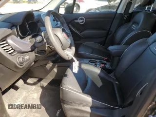2018 FIAT 500X Lounge with VIN ZFBCFXDB5JP664130, listed as a Copart auction lot 73784574 with 67,160 mi miles and Salvage title. Bid and sale history available at DreamBid. Image 7.