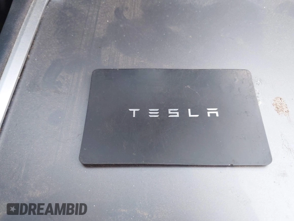 2022 Tesla Model Y Long Range with VIN 7SAYGDEE3NA007737, listed as a IAAI auction lot 42128359 with 42,597 mi miles and . Bid and sale history available at carsss.com. Image 11.