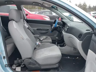 2008 Hyundai Accent GS with VIN KMHCM36C98U062601, listed as a IAAI auction lot 41565161 with 148,281 mi miles. Bid and sale history available at carsss.com. Image 5.