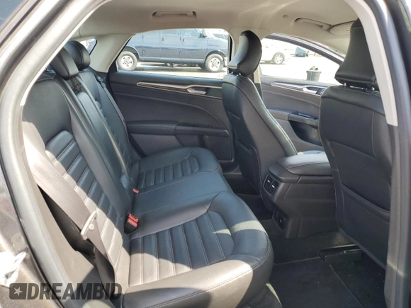 2016 Ford Fusion Energi SE Luxury with VIN 3FA6P0PU6GR310541, listed as a Copart auction lot 52297815 with 122,985 mi miles and Non Repairable. Bid and sale history available at carsss.com. Image 10.