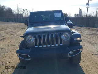 2018 Jeep Wrangler Unlimited Sahara with VIN 1C4HJXEN9JW303094, listed as a IAAI auction lot 41491564 with 66,128 mi miles and . Bid and sale history available at DreamBid. Image 12.