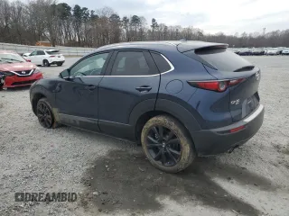 2023 Mazda CX-30 Premium with VIN 3MVDMBDY6PM507833, listed as a Copart auction lot 47166285 with 10,196 mi miles and Salvage title. Bid and sale history available at DreamBid. Image 2.
