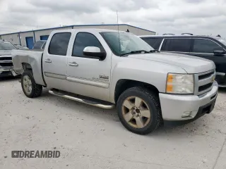 2011 Chevrolet Silverado 1500 LT with VIN 3GCPCSE06BG385931, listed as a Copart auction lot 52076985 with 187,151 mi miles and Salvage Title. Bid and sale history available at DreamBid. Image 4.