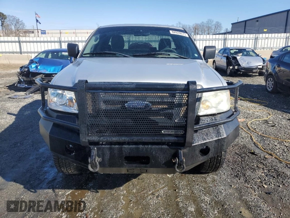 2005 Ford F-150 XL with VIN 1FTRF14535NB98598, listed as a Copart auction lot 88928675 with 214,304 mi miles and Salvage Title. Bid and sale history available at carsss.com. Image 5.