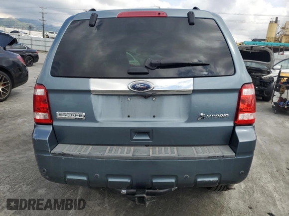 2010 Ford Escape Hybrid with VIN 1FMCU4K30AKC51022, listed as a Copart auction lot 51014615 with 128,275 mi miles and Salvage title. Bid and sale history available at DreamBid. Image 6.