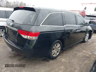 2016 Honda Odyssey EX-L with VIN 5FNRL5H65GB093937, listed as a IAAI auction lot 41691669 with 264,960 mi miles and . Bid and sale history available at DreamBid. Image 4.