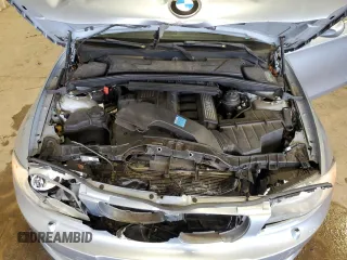 2011 BMW 1 Series 128i with VIN WBAUL7C57BVM80274, listed as a Copart auction lot 52127595 with 104,952 mi miles and Salvage title. Bid and sale history available at DreamBid. Image 11.