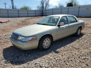 2005 Mercury Grand Marquis GS with VIN 2MEFM74W65X653770, listed as a Copart auction lot 50517115 with 153,709 mi miles and Salvage Title. Bid and sale history available at DreamBid. Image 1.