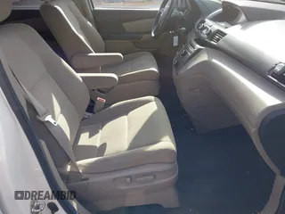 2014 Honda Odyssey LX with VIN 5FNRL5H24EB001551, listed as a IAAI auction lot 41879040 with 119,200 mi miles and . Bid and sale history available at DreamBid. Image 5.