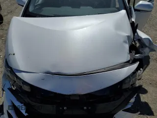 2021 Toyota Prius LE z VIN JTDKAMFP7M3191079, wystawiony jako Copart lot #57529195 z przebiegiem 52 809 mil mil oraz Szkoda całkowita • Salvage title. Historia ofert i sprzedaży dostępna na DreamBid. Obrazek 11.