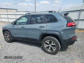 2014 Jeep Cherokee Trailhawk с VIN 1C4PJMBS1EW212024, выставлен на аукционе Copart как лот 58825265 с пробегом 99 087 миль миль и Списание • Salvage title. История ставок и продаж доступна на DreamBid. Изображение 2.