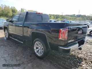 2016 GMC Sierra 1500 SLT with VIN 1GTV2NEC9GZ392952, listed as a Copart auction lot 71461064 with 103,767 mi miles and Salvage Title. Bid and sale history available at carsss.com. Image 2.