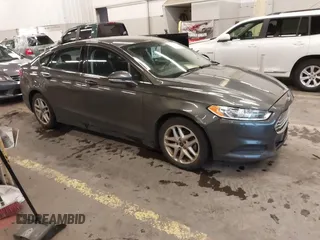 2015 Ford Fusion SE with VIN 1FA6P0H7XF5124074, listed as a IAAI auction lot 41658822 with 127,886 mi miles. Bid and sale history available at carsss.com. Image 1.