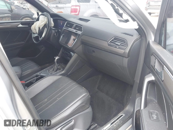 2022 Volkswagen Tiguan SE R-Line Black с VIN 3VVCB7AX1NM065960, выставлен на аукционе IAAI как лот 42149626 с пробегом 71 698 миль миль и . История ставок и продаж доступна на DreamBid. Изображение 5.