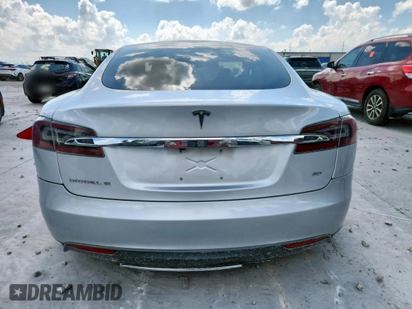 2013 Tesla Model S with VIN 5YJSA1CG5DFP03704, listed as a Copart auction lot 65143565 with Not provided miles and Clean title. Bid and sale history available at DreamBid. Image 6.