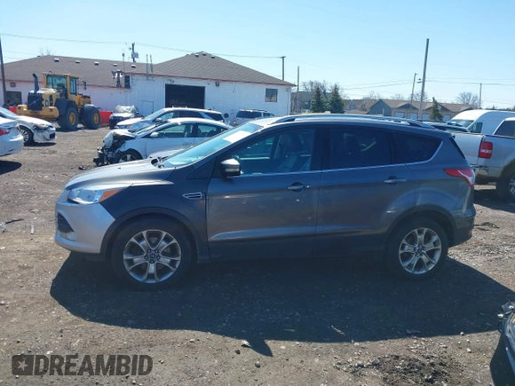 2014 Ford Escape Titanium with VIN 1FMCU9JX1EUB94776, listed as a IAAI auction lot 42063678 with 138,036 mi miles. Bid and sale history available at carsss.com. Image 14.