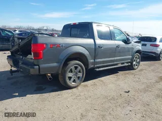 2018 Ford F-150 XL with VIN 1FTEW1E56JKE29843, listed as a IAAI auction lot 41292720 with 74,402 mi miles. Bid and sale history available at carsss.com. Image 4.