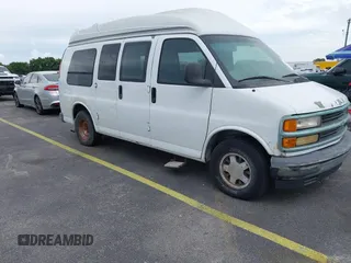 1999 Chevrolet Express with VIN 1GBFG15R5X1075479, listed as a IAAI auction lot 41729007 with 113,579 mi miles. Bid and sale history available at carsss.com. Image 1.