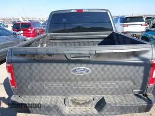 2019 Ford F-150 XL with VIN 1FTEW1CP4KKD69695, listed as a IAAI auction lot 41396598 with 103,855 mi miles and . Bid and sale history available at carsss.com. Image 16.