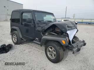 2003 Jeep Wrangler SE with VIN 1J4FA29113P351844, listed as a Copart auction lot 81411324 with 53,525 mi miles and Salvage title. Bid and sale history available at DreamBid. Image 4.