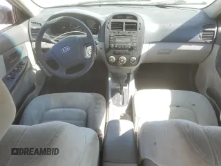 2009 Kia Spectra SX with VIN KNAFE221X95614791, listed as a Copart auction lot 75534254 with 195,288 mi miles and Salvage Title. Bid and sale history available at carsss.com. Image 8.