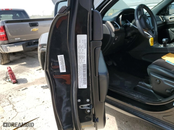 2015 Jeep Grand Cherokee Laredo with VIN 1C4RJFAG5FC724874, listed as a Copart auction lot 52462214 with 99,650 mi miles and Salvage Title. Bid and sale history available at carsss.com. Image 12.