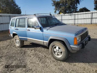 1991 Jeep Cherokee with VIN 1J4FJ58S1ML520376, listed as a Copart auction lot 75452364 with 147,982 mi miles and Salvage title. Bid and sale history available at DreamBid. Image 4.