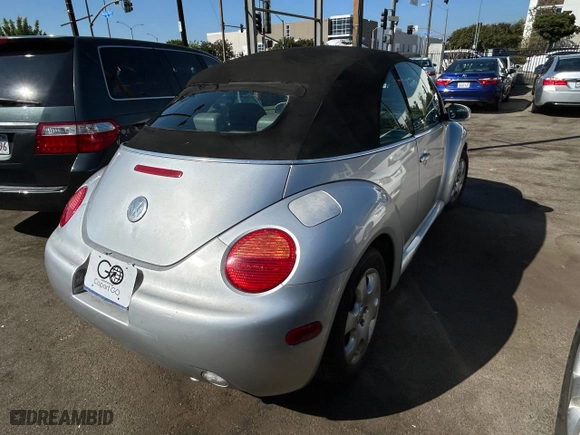 2003 Volkswagen New Beetle Convertible GLS with VIN 3VWCK21Y33M302680, listed as a Copart auction lot 76404034 with 124,203 mi miles and Clean Title. Bid and sale history available at carsss.com. Image 4.