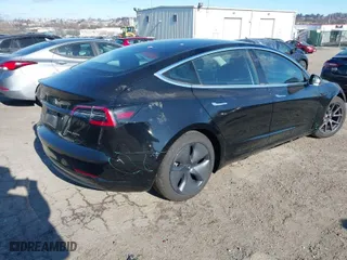 2020 Tesla Model 3 Long Range with VIN 5YJ3E1EB0LF800740, listed as a IAAI auction lot 41628876 with 52,130 mi miles. Bid and sale history available at carsss.com. Image 4.