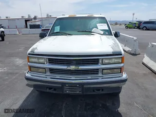 1997 Chevrolet Tahoe with VIN 1GNEK13R6VJ443195, listed as a IAAI auction lot 42000733 with 202,106 mi miles. Bid and sale history available at carsss.com. Image 6.