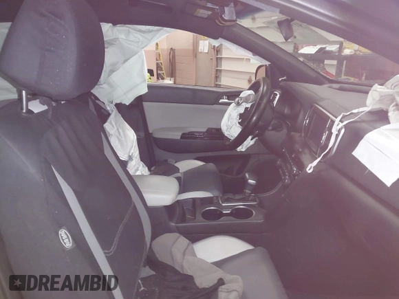 2019 Kia Sportage EX with VIN KNDPNCAC8K7567108, listed as a IAAI auction lot 41823169 with 30,567 mi miles and . Bid and sale history available at DreamBid. Image 5.