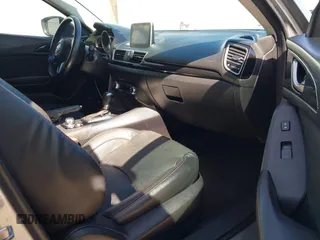 2015 Mazda 3 i Touring with VIN 3MZBM1L75FM224525, listed as a IAAI auction lot 41692928 with 57,803 mi miles and . Bid and sale history available at carsss.com. Image 5.