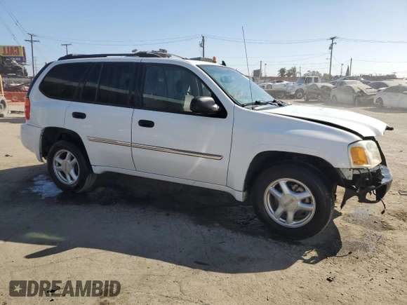 2008 GMC Envoy SLE1 with VIN 1GKDS13S182137239, listed as a Copart auction lot 69627594 with 135,160 mi miles and Salvage Title. Bid and sale history available at DreamBid. Image 4.